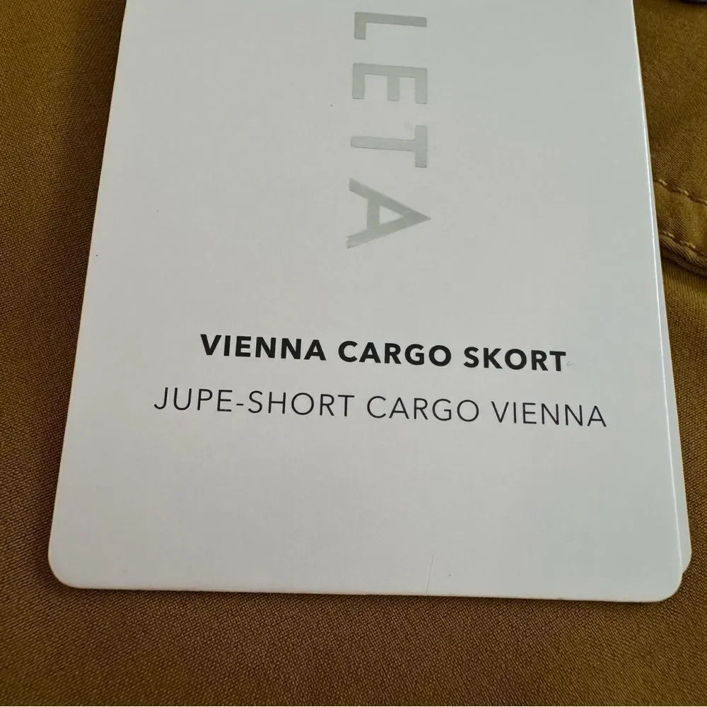 NWT Athleta Vienna Cargo Pocket Mini Skort in Gold Size 12